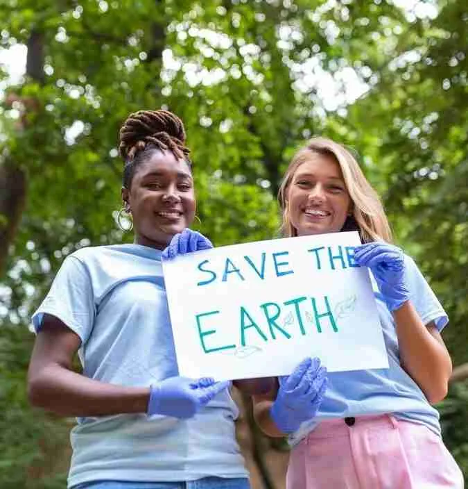 two-volunteers-different-races-hold-paper-show-how-important-it-is-take-care-environment-volunteering-concept_1212-7574-transformed